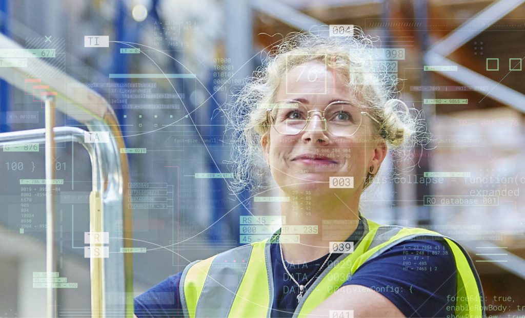 ILG warehouse employee looking at data screen