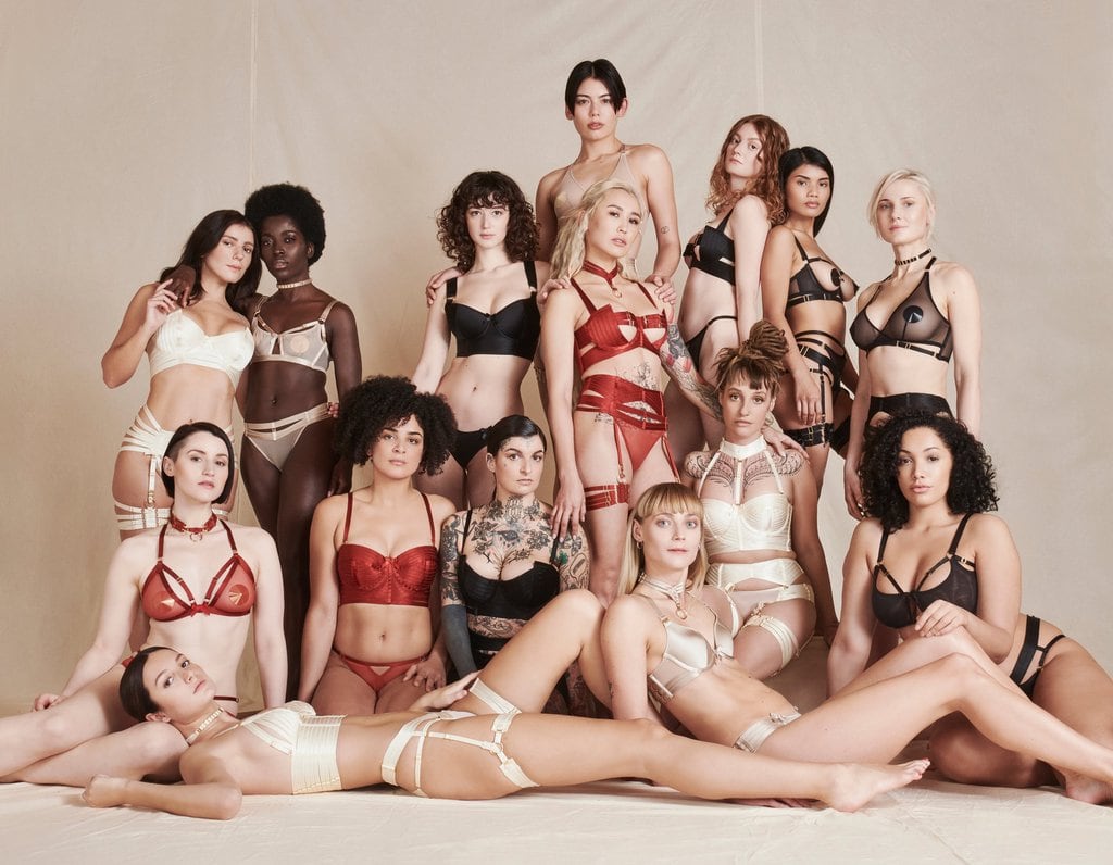 A group of underwear models in a studio